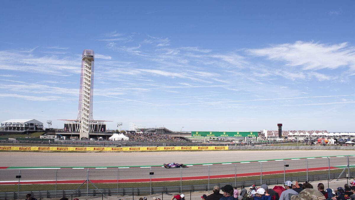 A Formula 1 car passes the observation tower at the Circuit of the Americas during the 2018 US Grand Prix