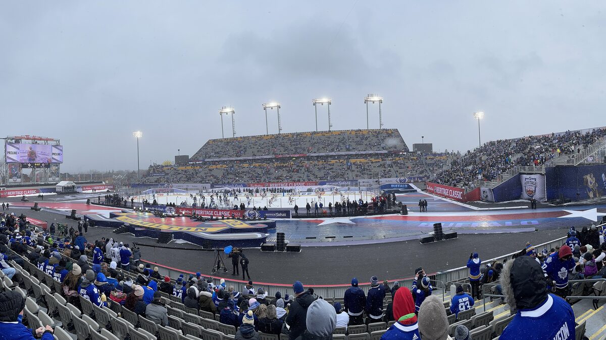 Outdoor rink and crowd at the 2022 NHL Heritage Classic at Tim Hortons Field in Hamilton, Ontario